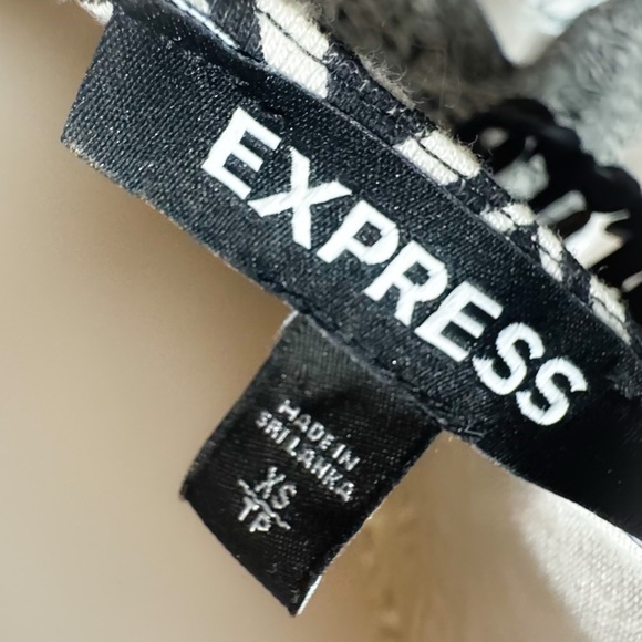 Express Aztec print plunge neck empire waist mini dress built in shorts! ❤️ - Picture 5 of 6